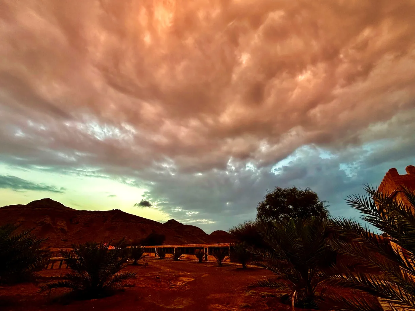 A copper sky over the resort and the mountains