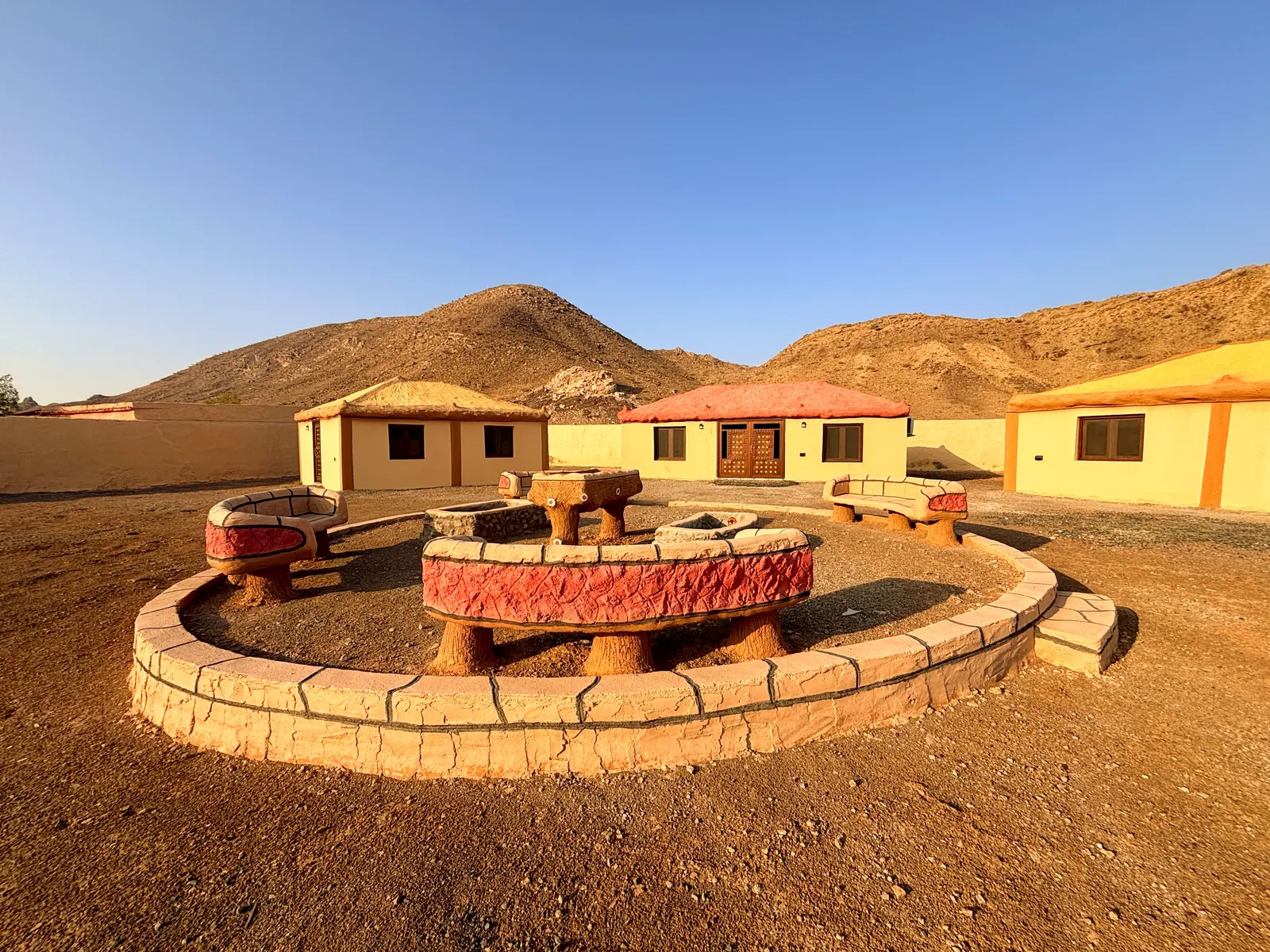 The Fort’s courtyard with its fire-pit seating and rooms
