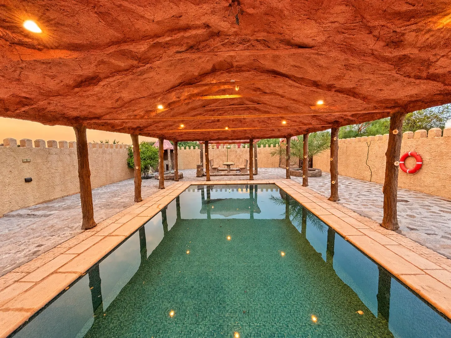 The shaded swimming pool at the resort